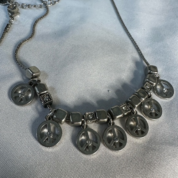 Silvertone multi peace sign charm style dangle necklace - Picture 5 of 5